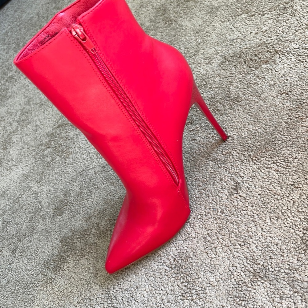 Brand new Red ankle boots.